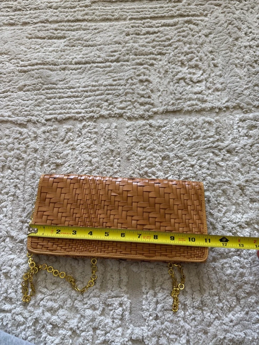 Cole Haan's iconic Genevieve woven leather tan crossbody bag
